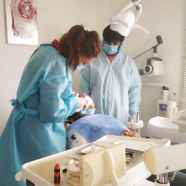 Neharika Yadav checking a patient at her clinic