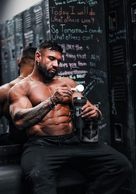 Neil Currey preparing his supplement drinks