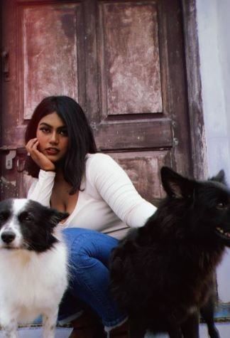 Nejm with her pet dogs