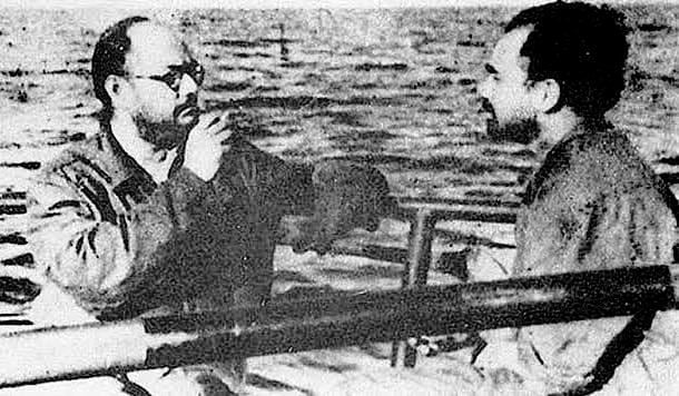 Netaji Subhas Chandra Bose smoking a cigarette on the hull of the U-boat