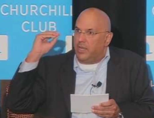 Neville Roy Singham during a business conference