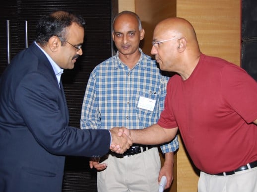 Neville Roy Singham while meeting Sitaraman in Bangalore