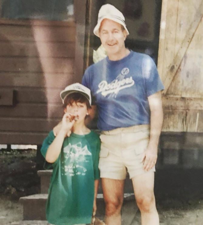 Nick Kroll smoking a cigar