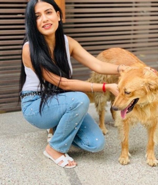 Nidhi Chaudhary with her pet dog