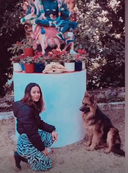 Nidhi Goyal with a dog