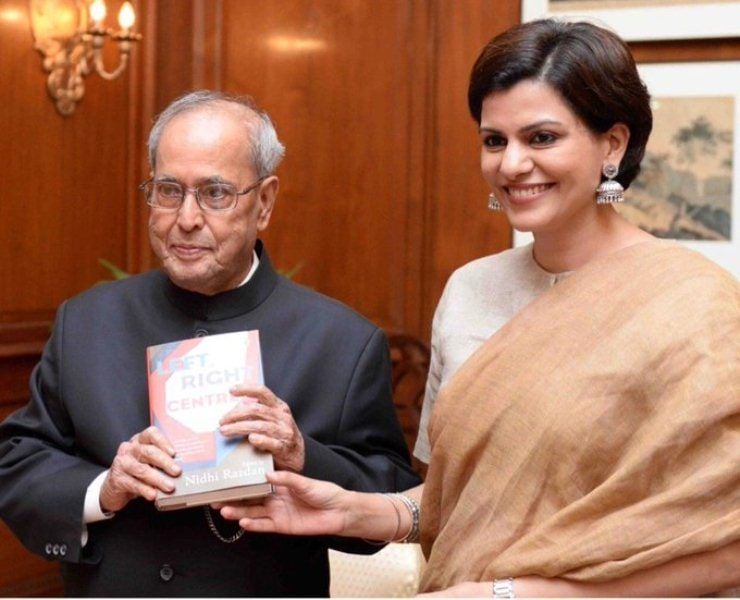 Nidhi Razdan with Pranab Mukherjee presenting her book in Rashtrapati Bhavan