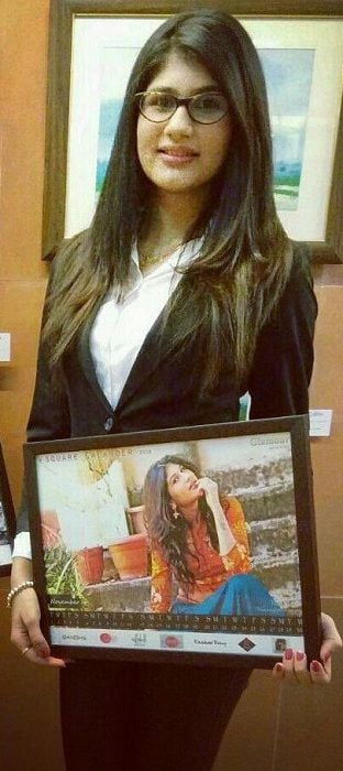 Nidhi Tapadia showing her picture on VSquare Calendar 2016