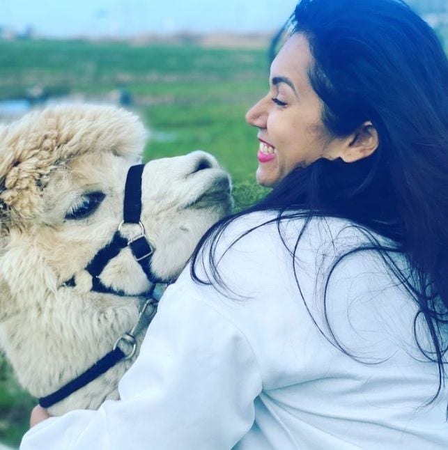 Niiniin Kassim with an Alpaca