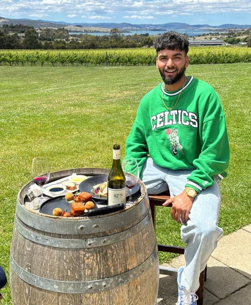 Nikhil Chaudhary having wine