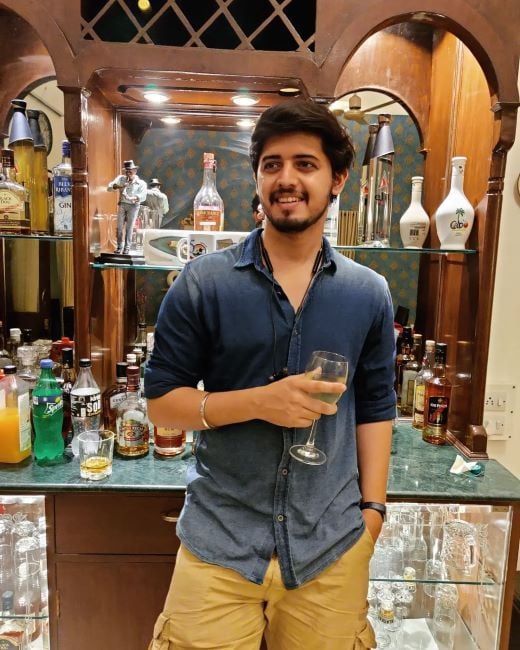Nikhil Damle with an alcoholic drink