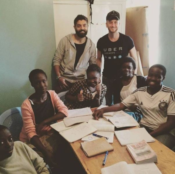 Nikhil Patel (left), along with a team member of the company Uber (right), at the R. O. C. K. organisation