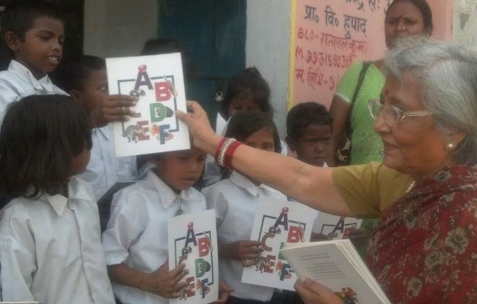Nilima Sinha while donating books to the students of a government school