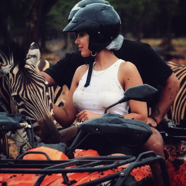 Nisha Aaliya with a zebra
