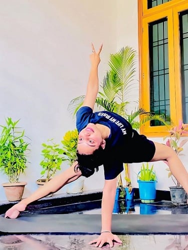 Nisha Mishra doing yoga