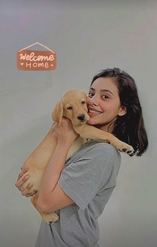 Nisha Mishra with her pet dog
