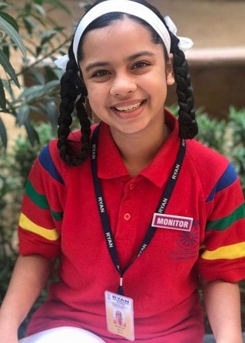 Nitanshi Goel wearing a monitor batch