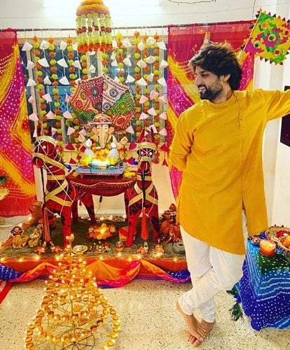 Nitin Chauhaan with an idol of lord Ganesha