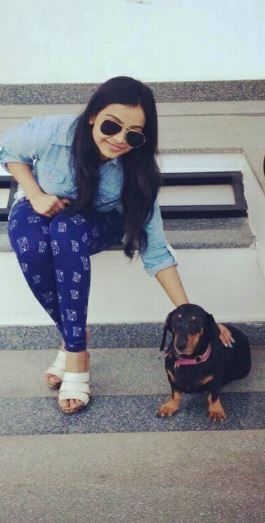 Nitya Shetty with a dog