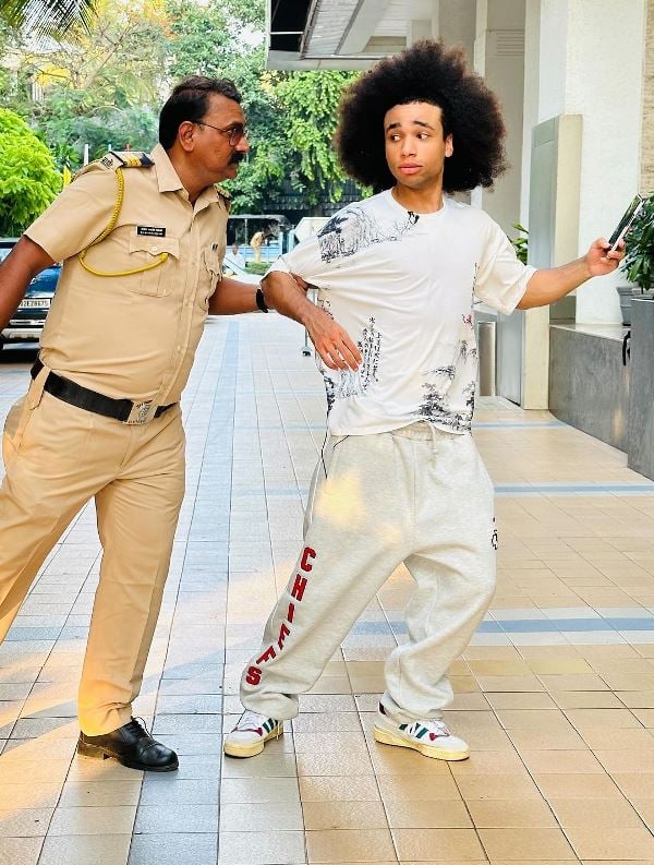 Noel Robinson (right) dancing with Amol Kamble