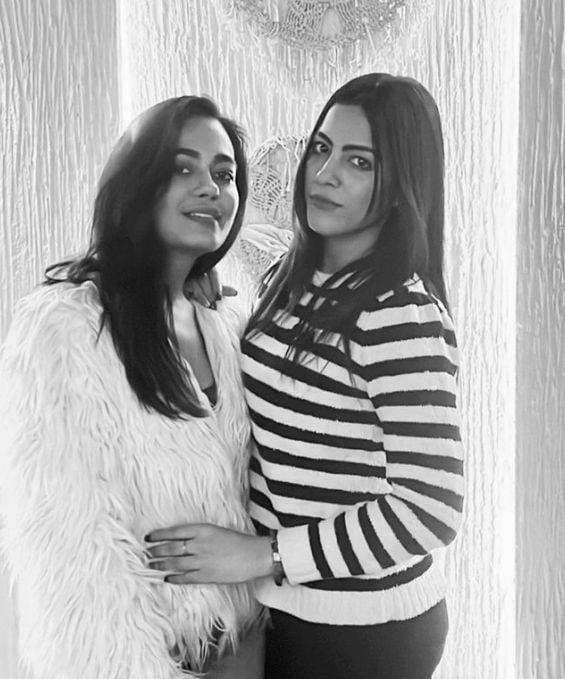 Noor and Shikha posing for a picture
