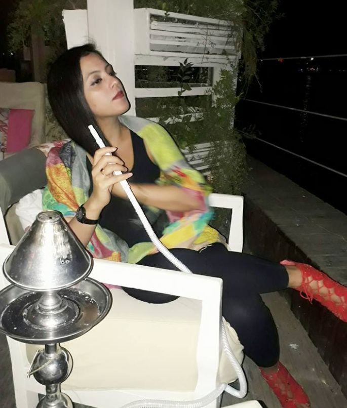 Noor smoking a hukkah