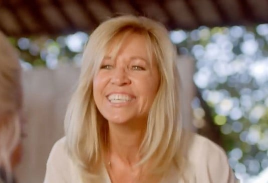 Norma Strait in a still from the music video of the song Codigo