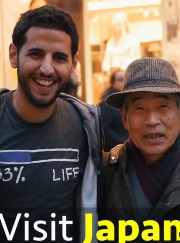 Nuseir Yassin (left) in a still from one of his 1000 daily videos