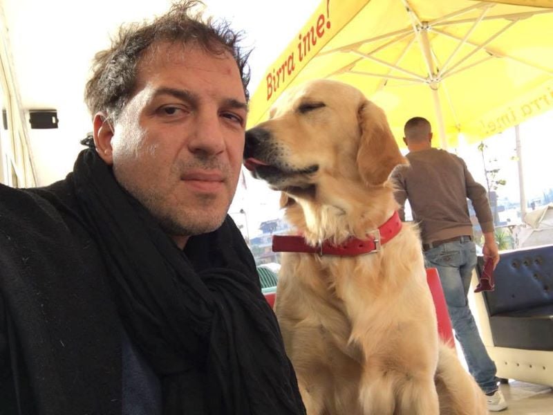 Ols Abazi with his Golden Retriever