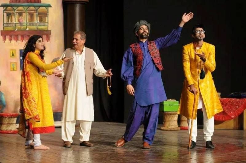 Omair Rana performing in theatre play