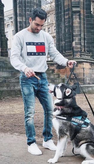 Omer Shahzad with a dog