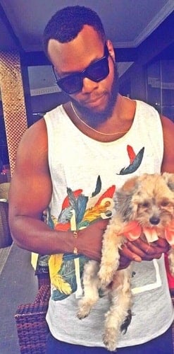 Oseloka Mbadiwe with his pet dog