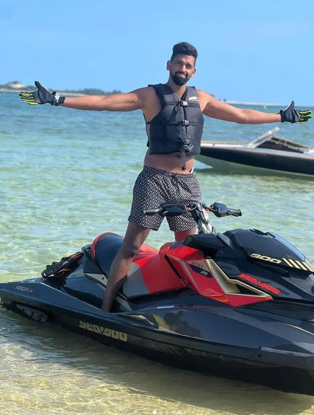 Ossman Idrisse doing water sports