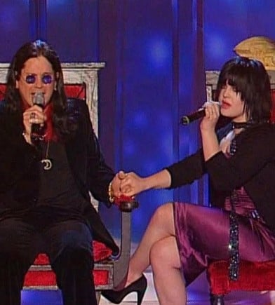 Ozzy Osbourne with Kelly Osbourne while singing the song 