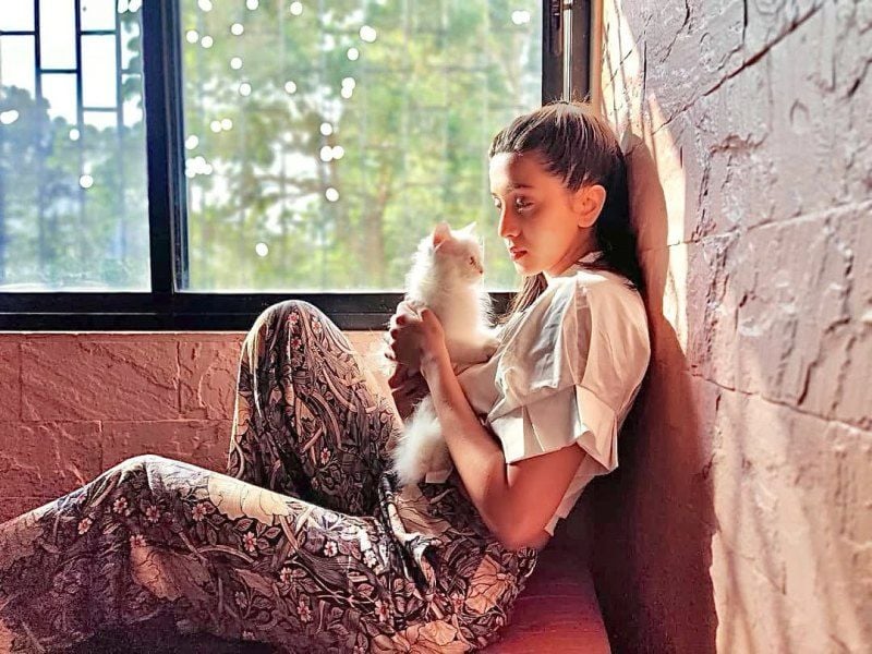 Palak Jaiswal with a cat