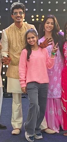 Palash Muchhal with Nandika Dwivedi (in pink)