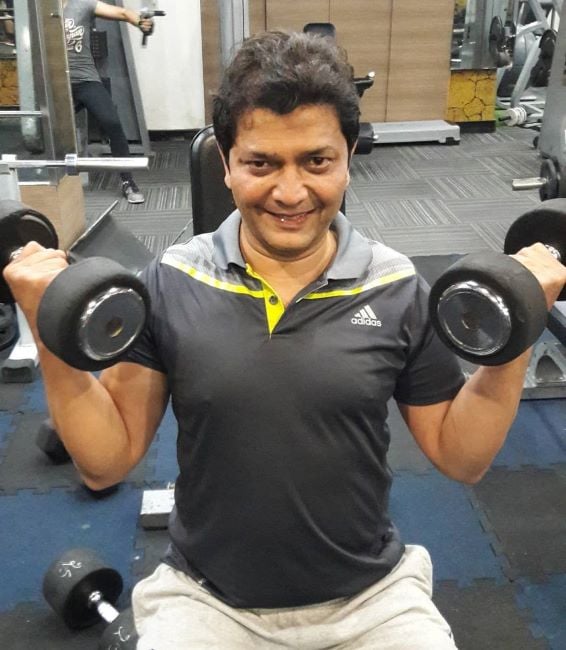 Pankaj Bhargava working out at the gym