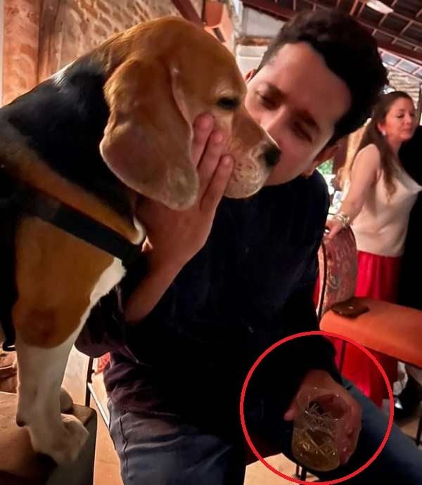 Parambrata Chatterjee holding a glass of alcohol