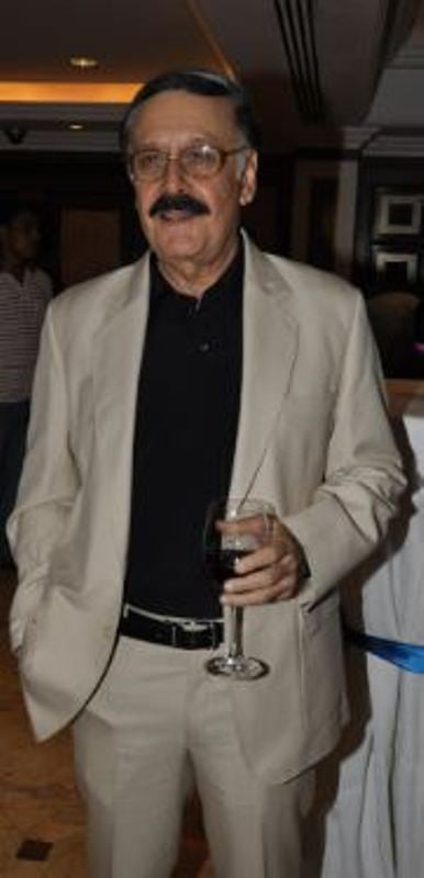 Parikshit Sahni holding his alcoholic beverage