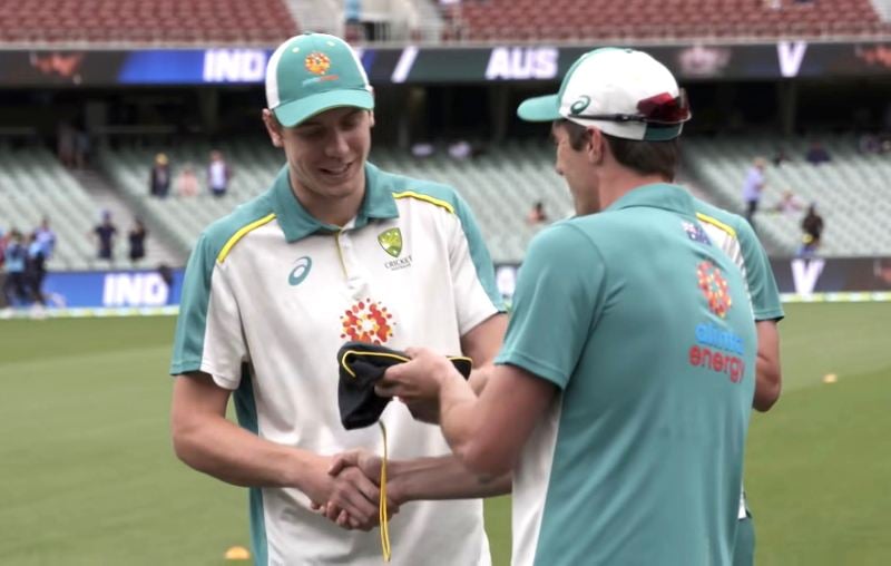 Pat Cummins presenting Cameron Green with his Test cap
