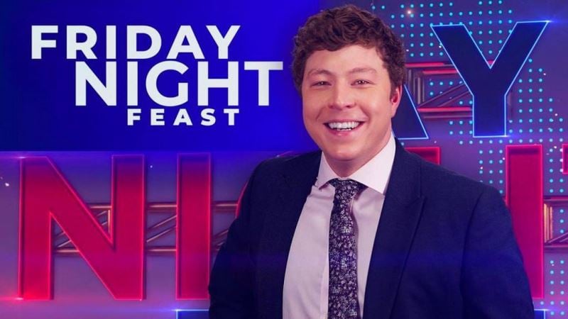 Patrick Christys as the host of the talk-show 