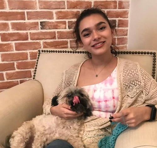 Paulina Chávez with her pet dog