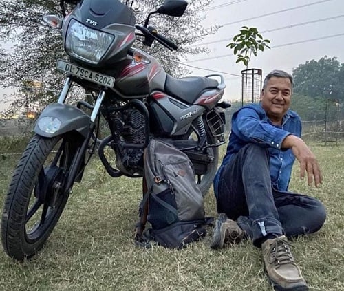 Peepal Baba with his motorcycle
