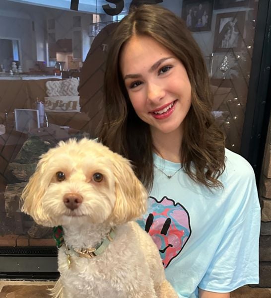 Peja with her pet dog