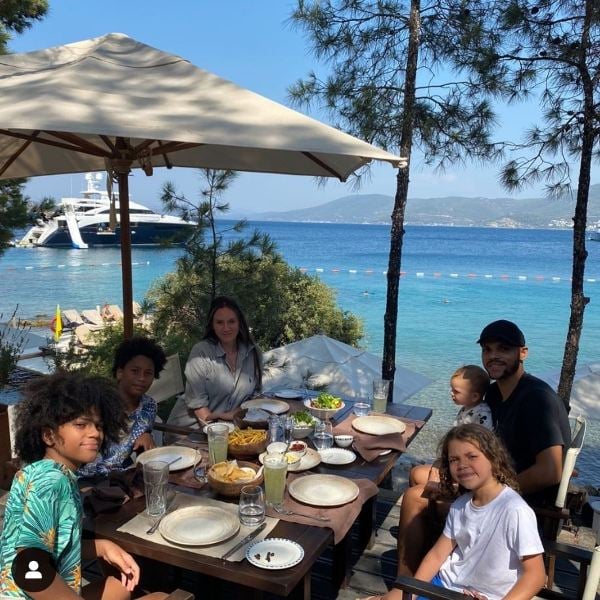Photo of Martin Braithwaite with his family dining at one of their restaurant