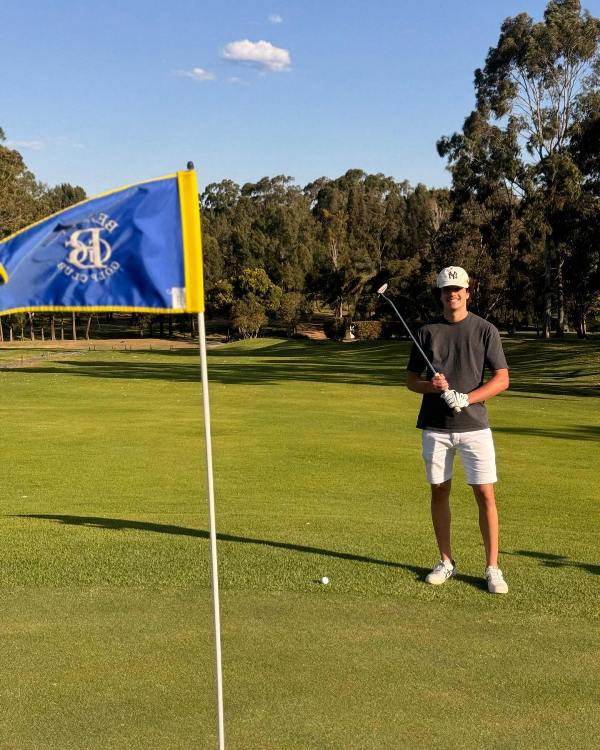 Photo of Sam Konstas while playing golf