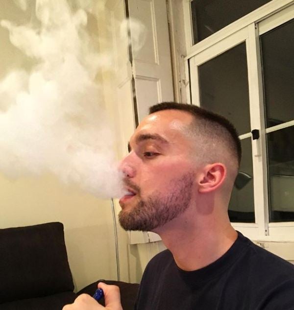 Photo of Tiago Rufino while smoking