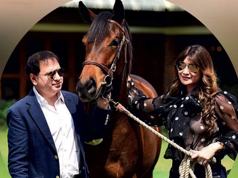 Photo of Yohan Poonawalla and his wife at their Stud Farm in Pune