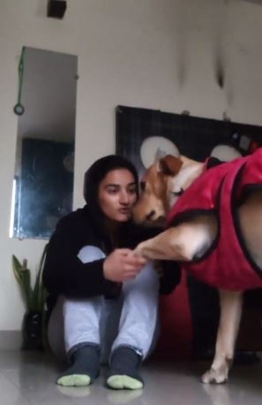 Piyu Sharma with her dog