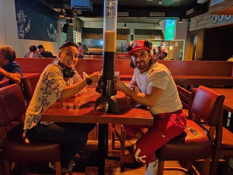 Piyu Sharma drinking beer with her friend