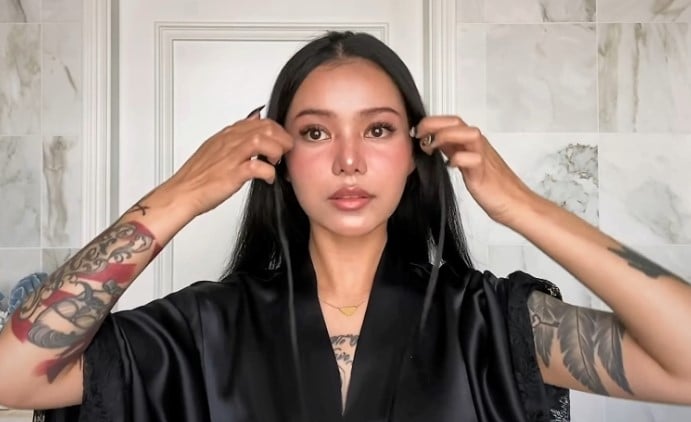 Poarch shows her Tik-Tok makeup routine for Vogue Taiwan in 2021